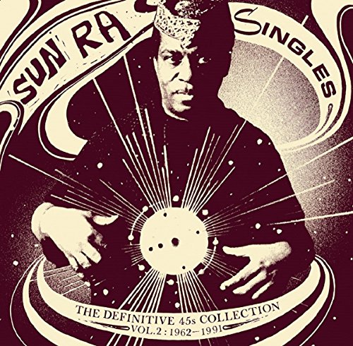 Sun Ra portrait on album cover with cosmic ray burst design.