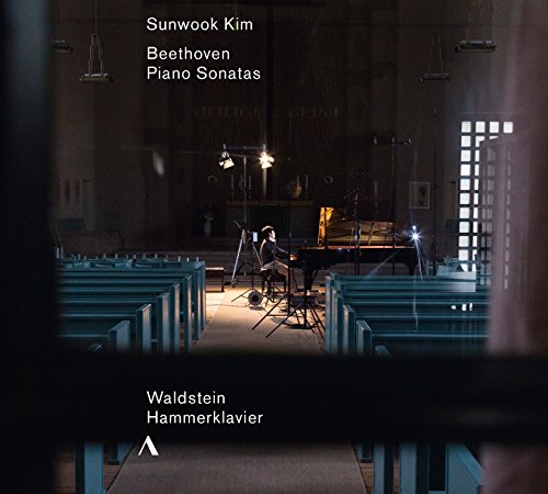 CD cover: pianist at a grand piano in a church interior.