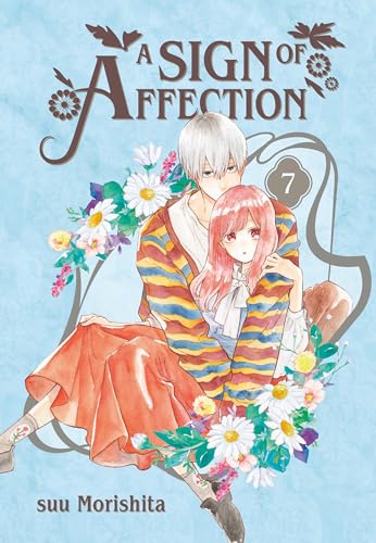A manga cover featuring a young couple embracing surrounded by flowers on blue background.