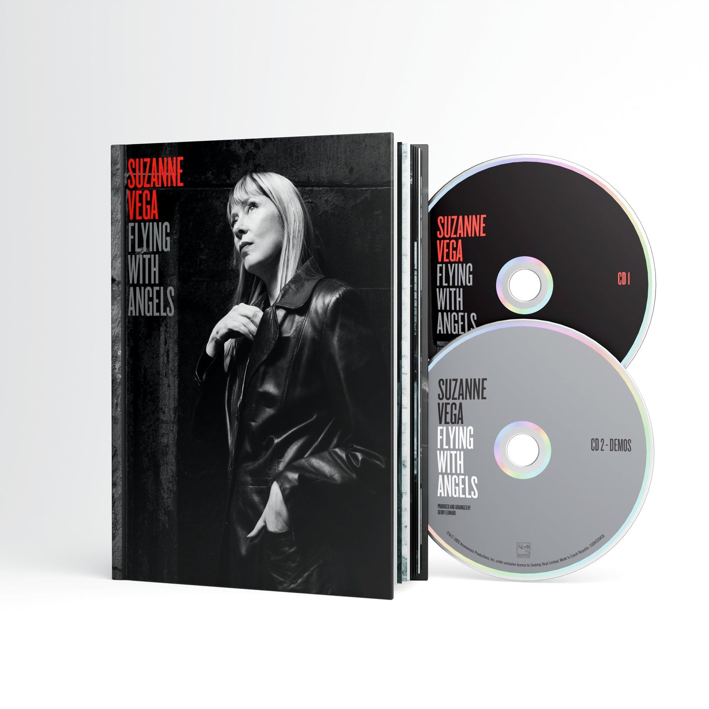 Suzanne Vega “Flying With Angels” CD case and two silver discs.