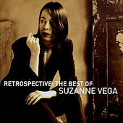 Suzanne Vega album cover: portrait of singer against a textured wall.
