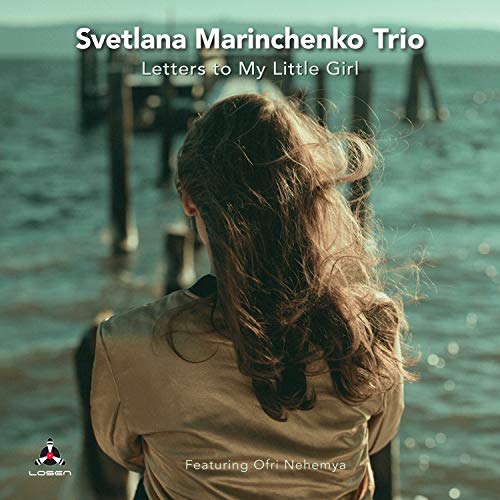 CD cover: woman with long hair facing the ocean, text overlay.