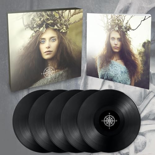 Vinyl records and album covers featuring a woman with a crown of branches.