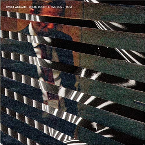 Album cover with a blurred figure seen through striped shadows.