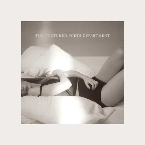 Taylor Swift album cover: person reclining on a bed, black and white.