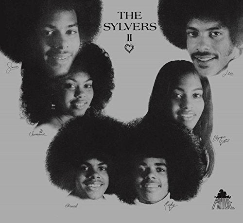 Black and white portrait of The Sylvers family, album cover.