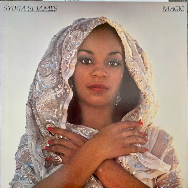 Sylvia St. James album cover, “Magic”, showing a woman in a beaded headscarf.