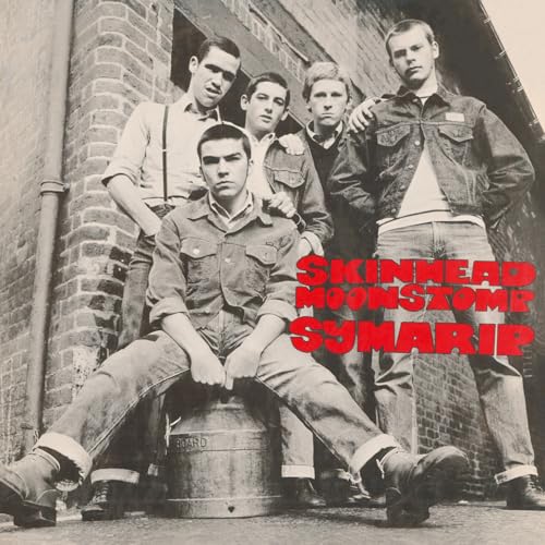 Black and white photo of five young men in 1960s skinhead style.