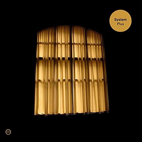 CD cover with a golden, textured window and yellow circular text.