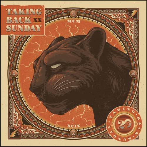Black panther head with ornate orange and brown circular design.