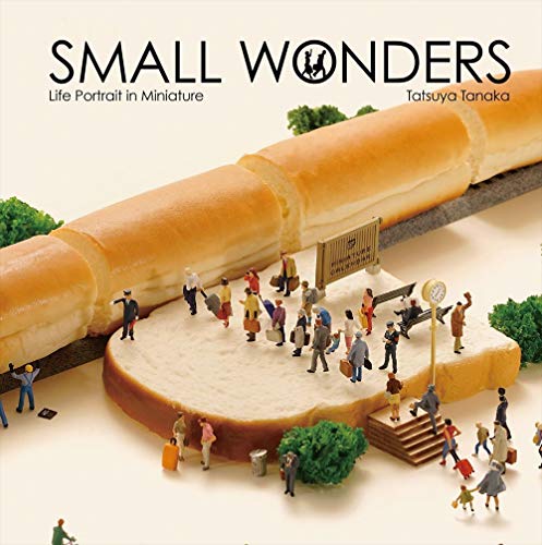 Miniature people wait for a train made of bread on a slice of toast.