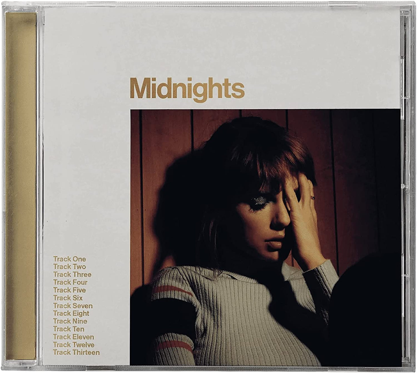 Taylor Swift’s “Midnights” CD cover with a portrait of the artist.