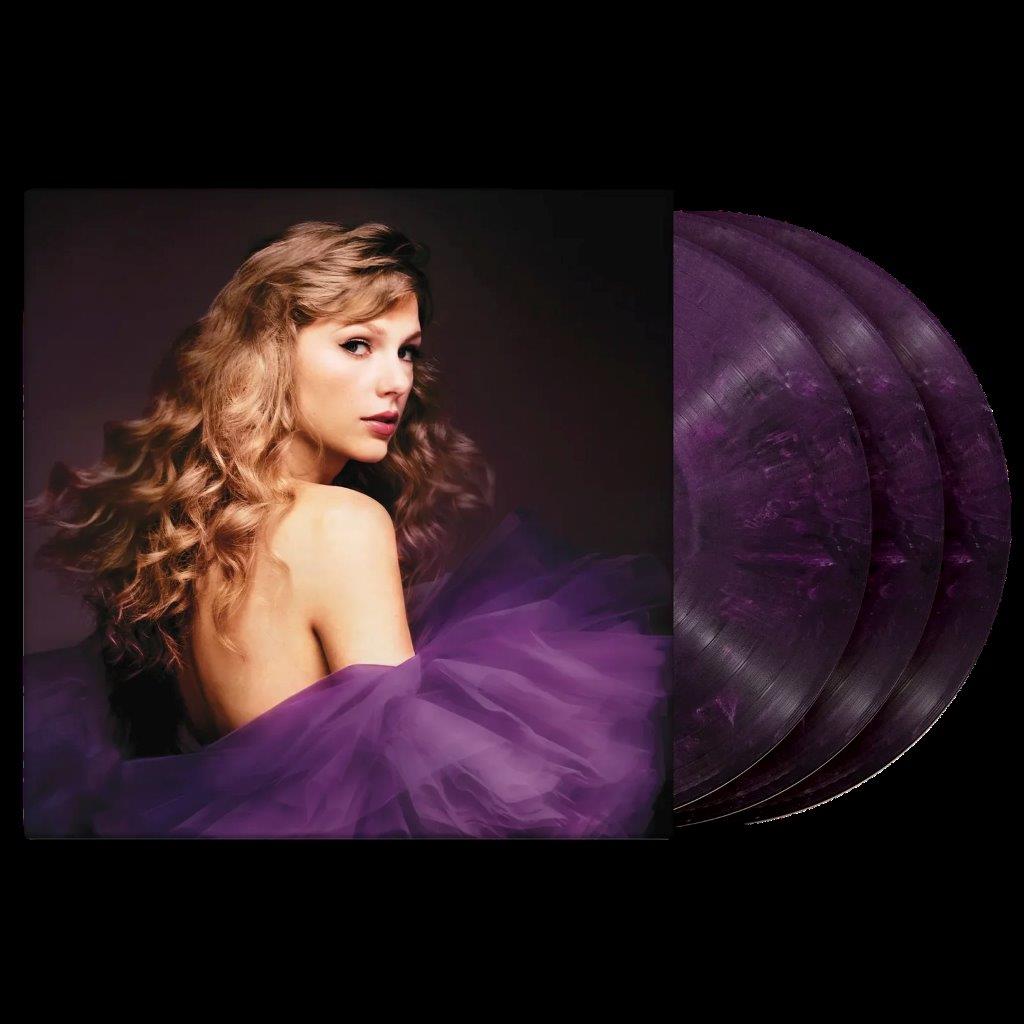 "Purple vinyl records with a cover featuring a woman in a purple dress."