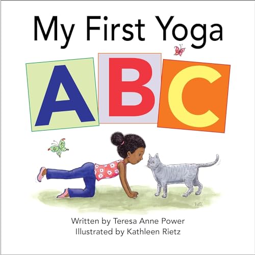 Book cover: child doing yoga with a cat, featuring large alphabet blocks.