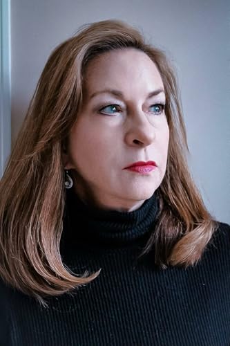 Woman with brown hair and red lipstick looking to the side.