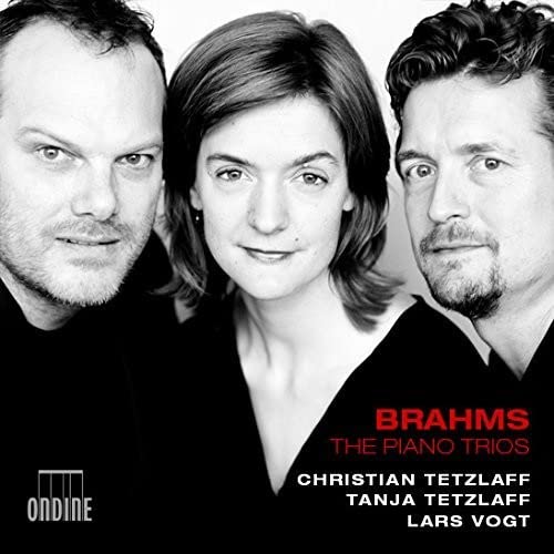 Black and white portrait of three musicians, Tetzlaff, Vogt, and Tetzlaff.