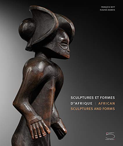 Dark wood African sculpture of a figure with elaborate headdress.