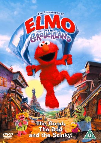 Elmo on DVD cover, standing in a colorful town with Sesame Street characters.
