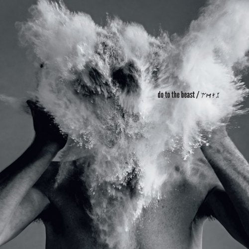 Black and white album cover with a person obscured by exploding powder.