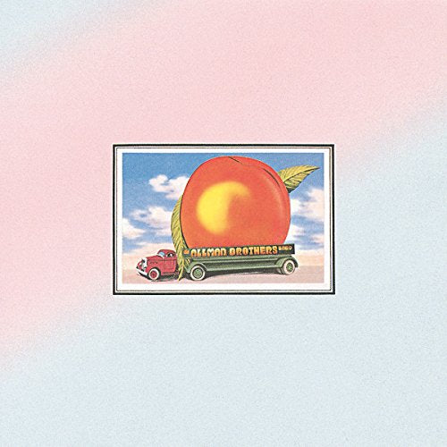 A flatbed truck carries a giant peach against a blue sky on a gradient background.