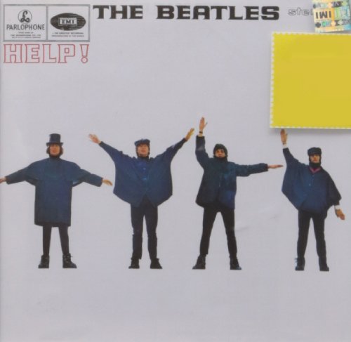 The Beatles "Help!" album cover with four figures in blue coats.