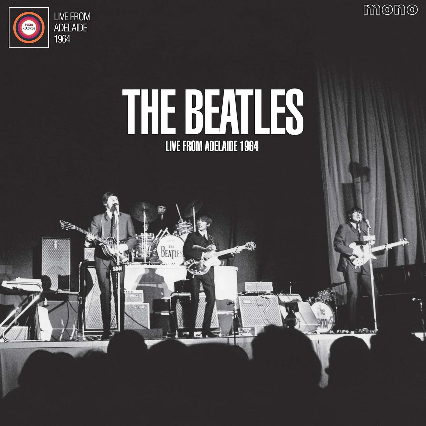 The Beatles album cover: black and white photo of the band performing.