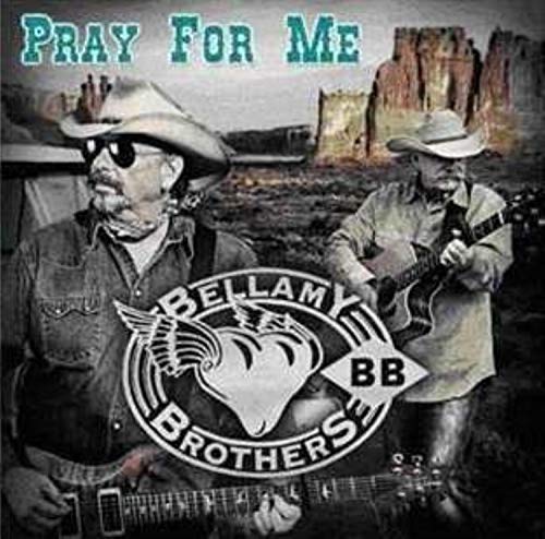 CD cover featuring two men with cowboy hats and a desert landscape.