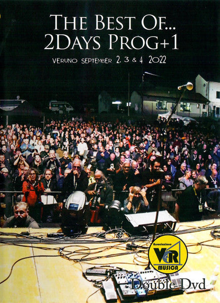 Crowd at an outdoor concert with musicians on stage, DVD cover.