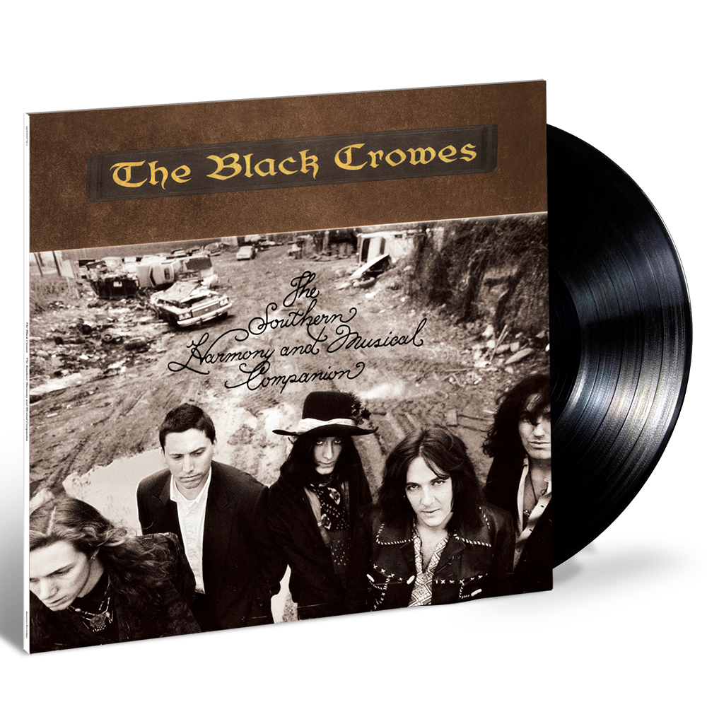 The Black Crowes vinyl record with band photo and landscape background.