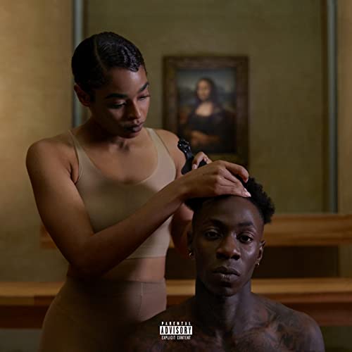 Album cover featuring Beyoncé and Jay-Z in front of a painting.