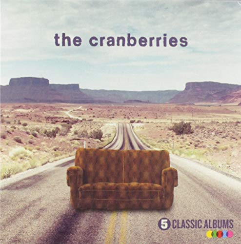 The Cranberries album cover with desert landscape and a brown couch.