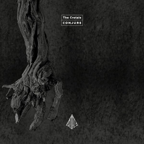 Black and white album cover featuring a gnarled tree root against a dark background.