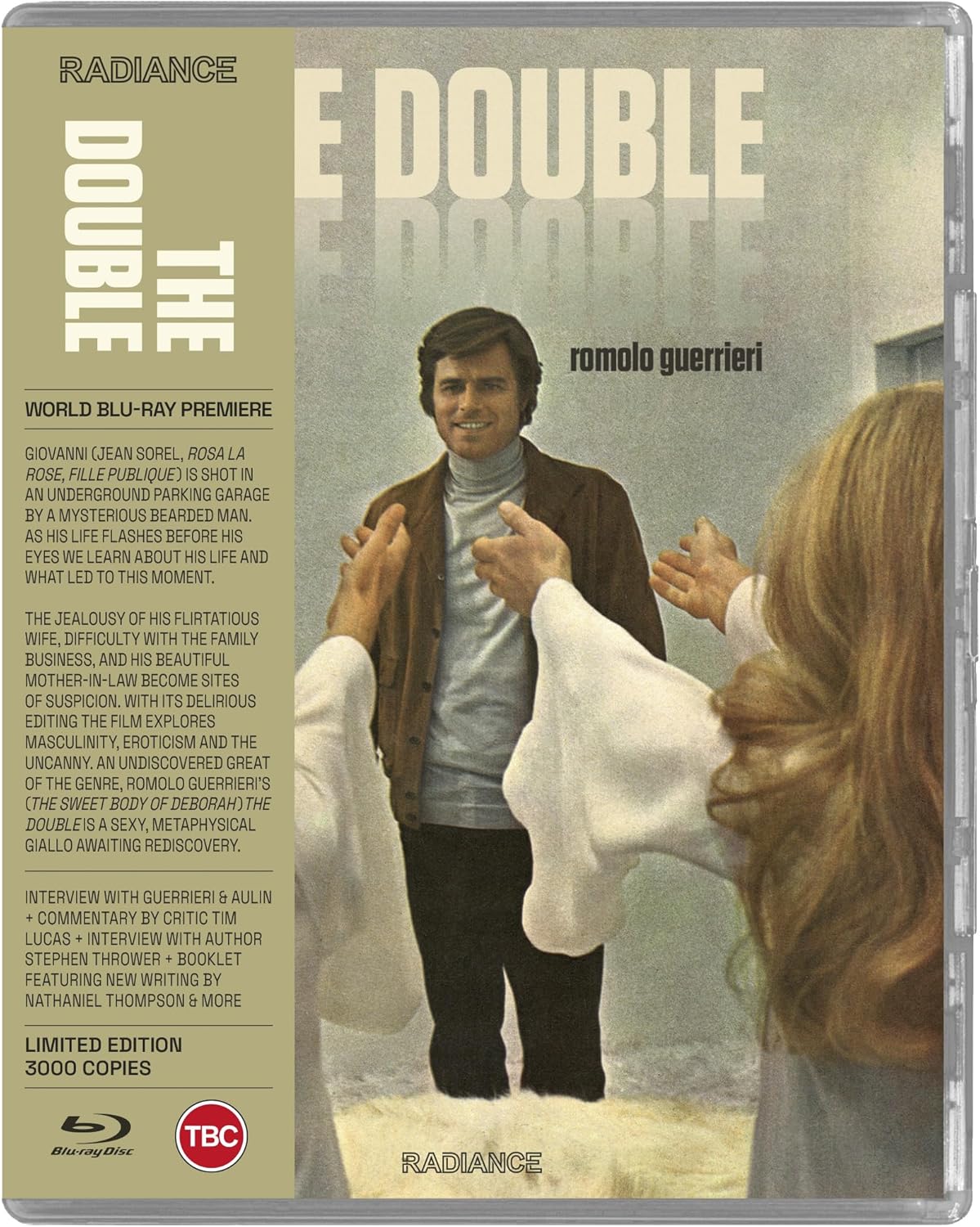 Blu-ray cover for “The Double” featuring a man in a beige suit.