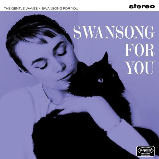 Record album cover featuring a woman embracing a black cat.