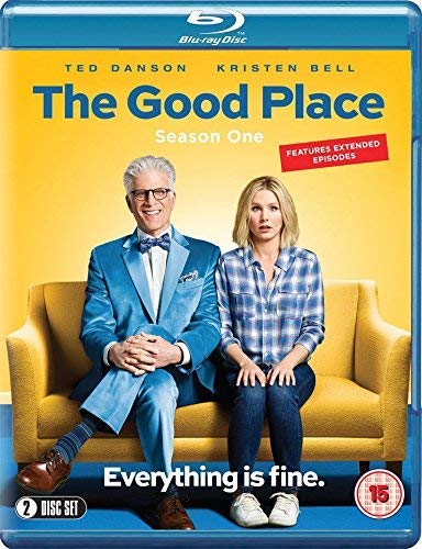 Blu-ray case with man and woman sitting on yellow couch, smiling.