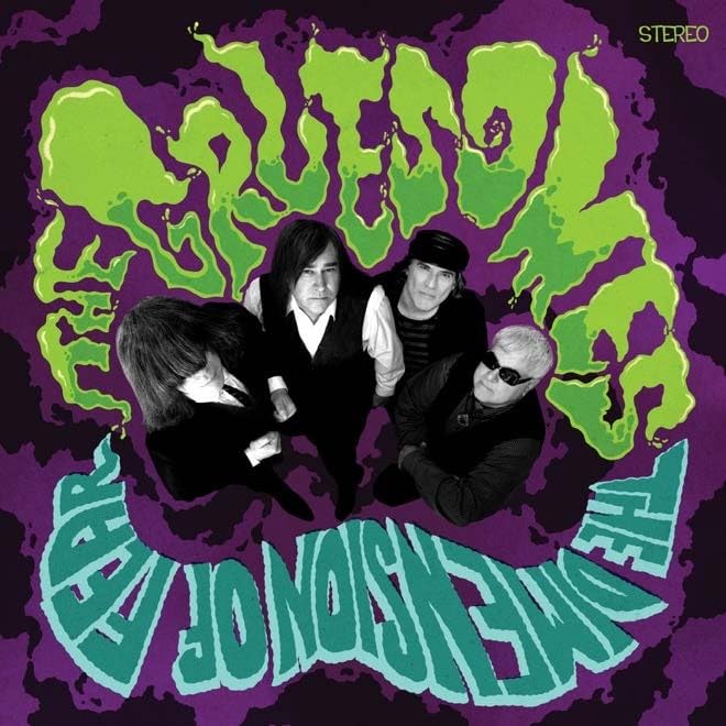 Record album cover featuring a band portrait with green slime effects.