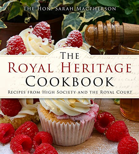 Cookbook cover with cupcakes, raspberries, and honey dipper.
