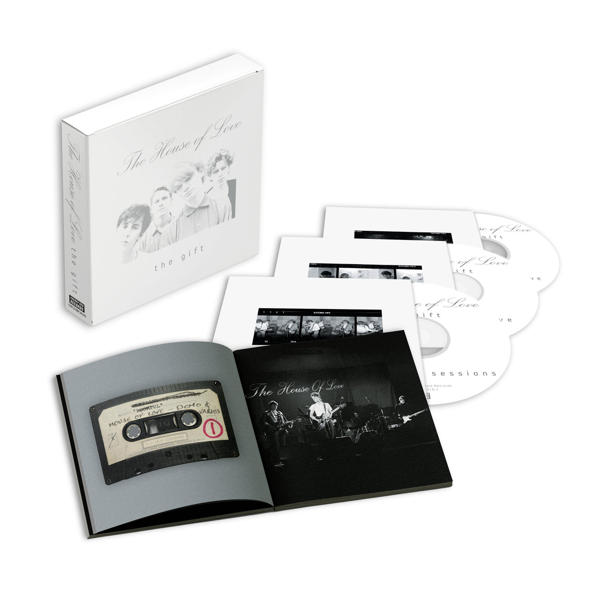 White CD box set with black and white band photo and cassette tape imagery.