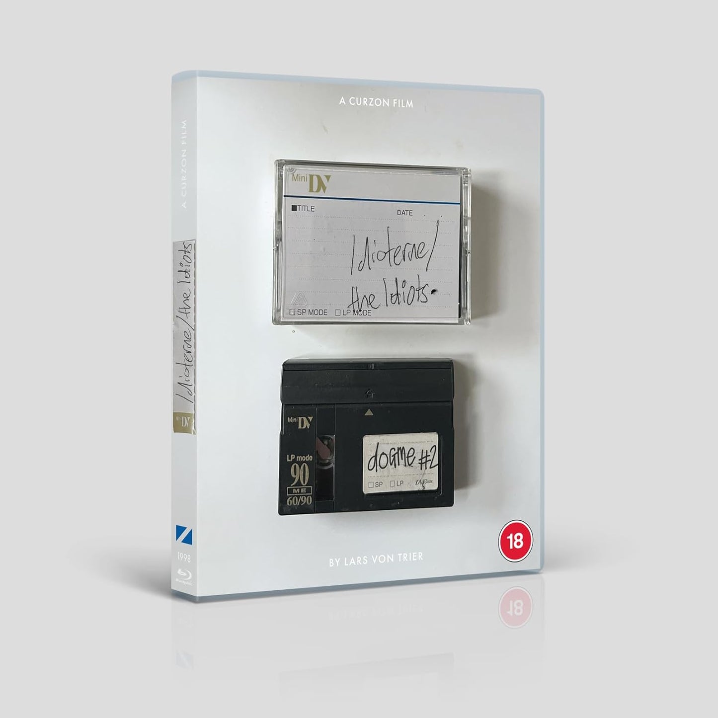 āThe Idiotsā Blu-ray case with two VHS tapes affixed to the cover.