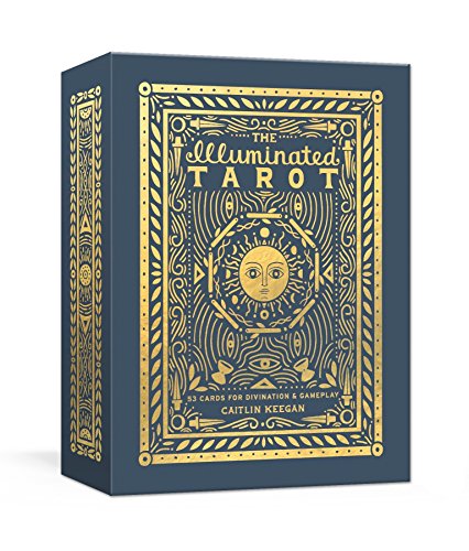 Dark blue tarot box with ornate gold foil sun and geometric designs.