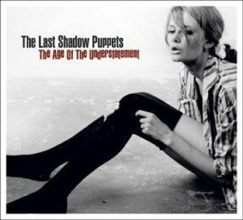 Black and white album cover featuring a woman with legs outstretched.
