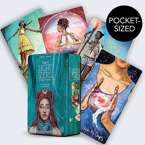 Tarot cards and tin box with colorful, illustrated figures and celestial imagery.
