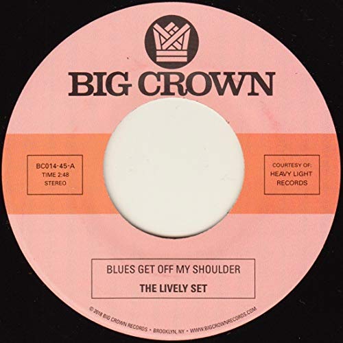 Pink and black vinyl record label with text: "Blues Get Off My Shoulder".