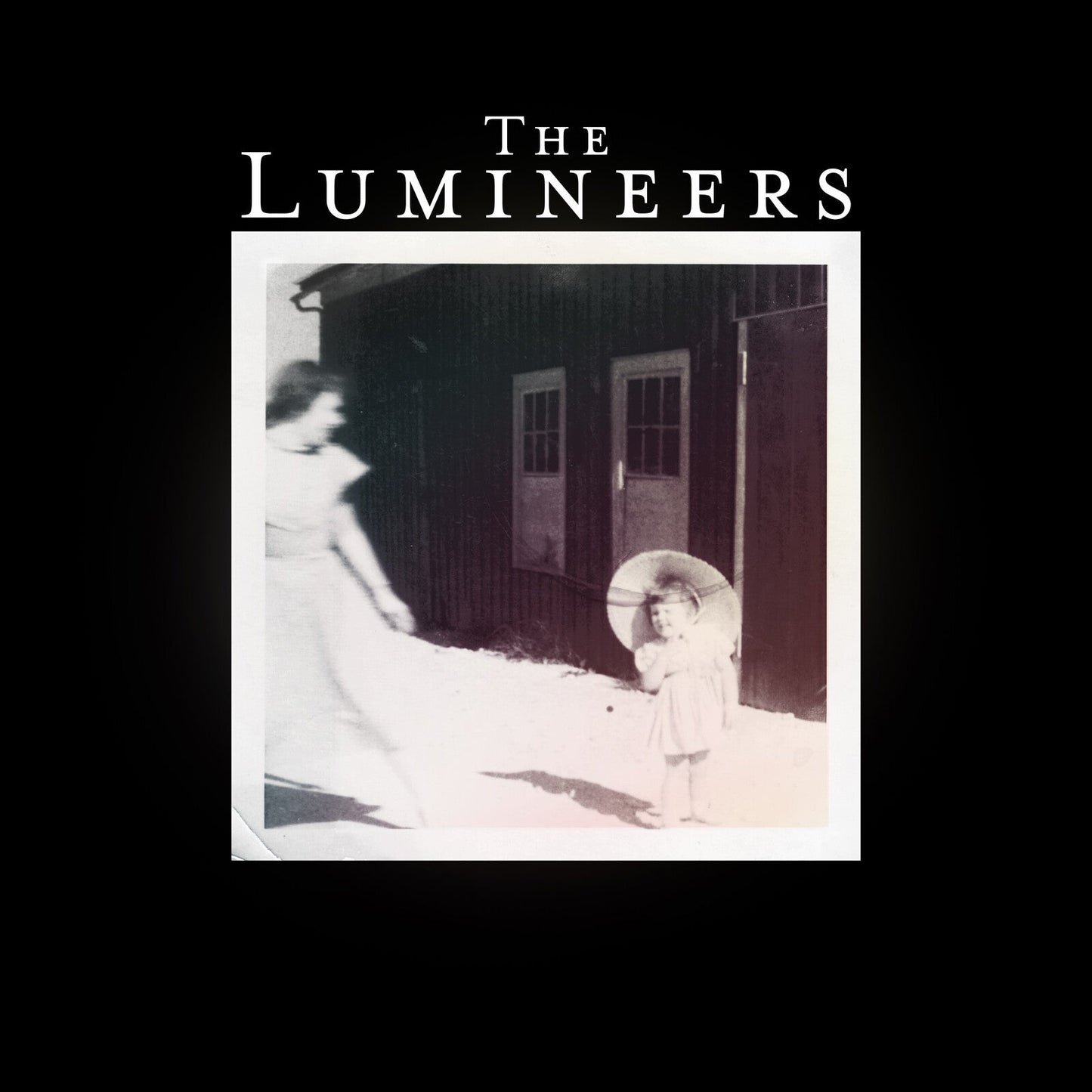 The Lumineers album cover: black and white photo of children.