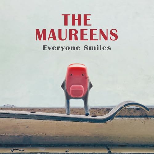 Album cover for The Maureens’ “Everyone Smiles” featuring a red toy robot.