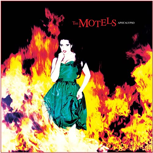 CD cover: woman in green dress amidst vibrant orange flames.