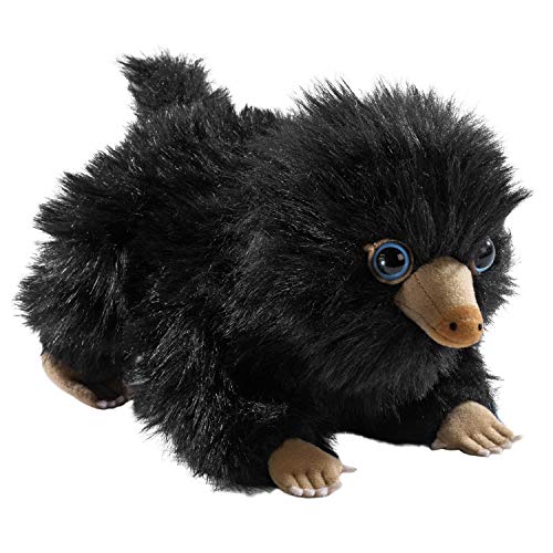 Black, fluffy Niffler plush toy with large blue eyes and a tan beak.