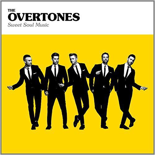 "Album cover with five men in suits on a yellow background."