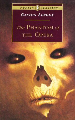 Book cover of "The Phantom of the Opera" with a masked face.