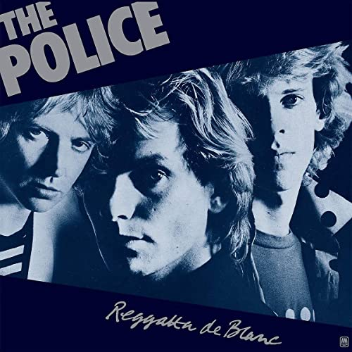 Album cover featuring The Police band members in a blue-toned, angled portrait photograph.